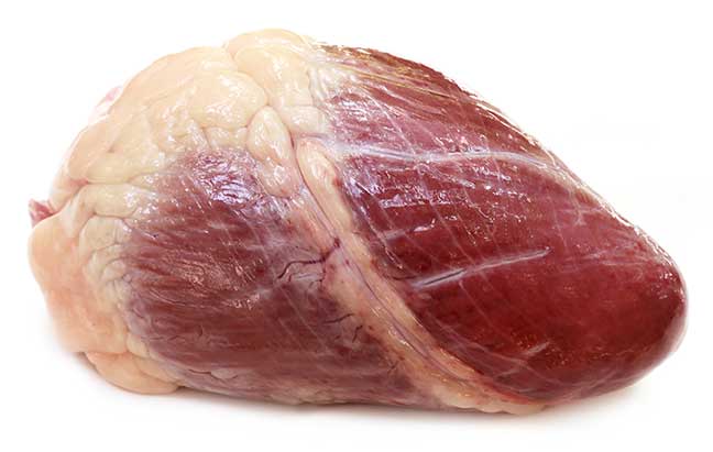 Beef heart over white background